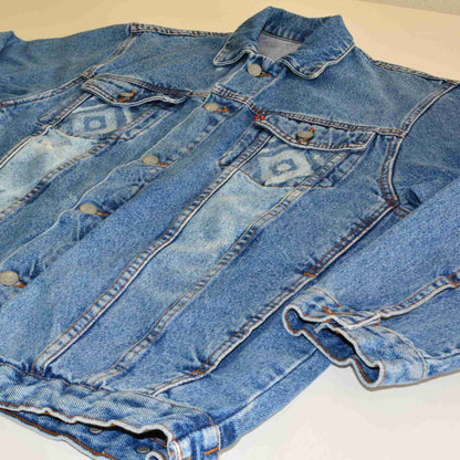 a pair of blue jean jackets with numbers on them.