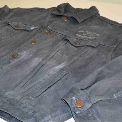 a pair of gray pants laying on top of a table.