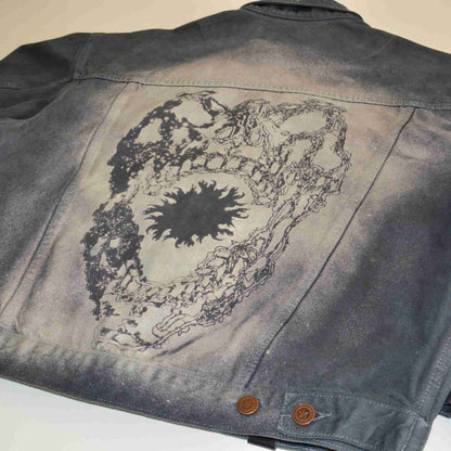 a jacket with a picture of a tree on it.