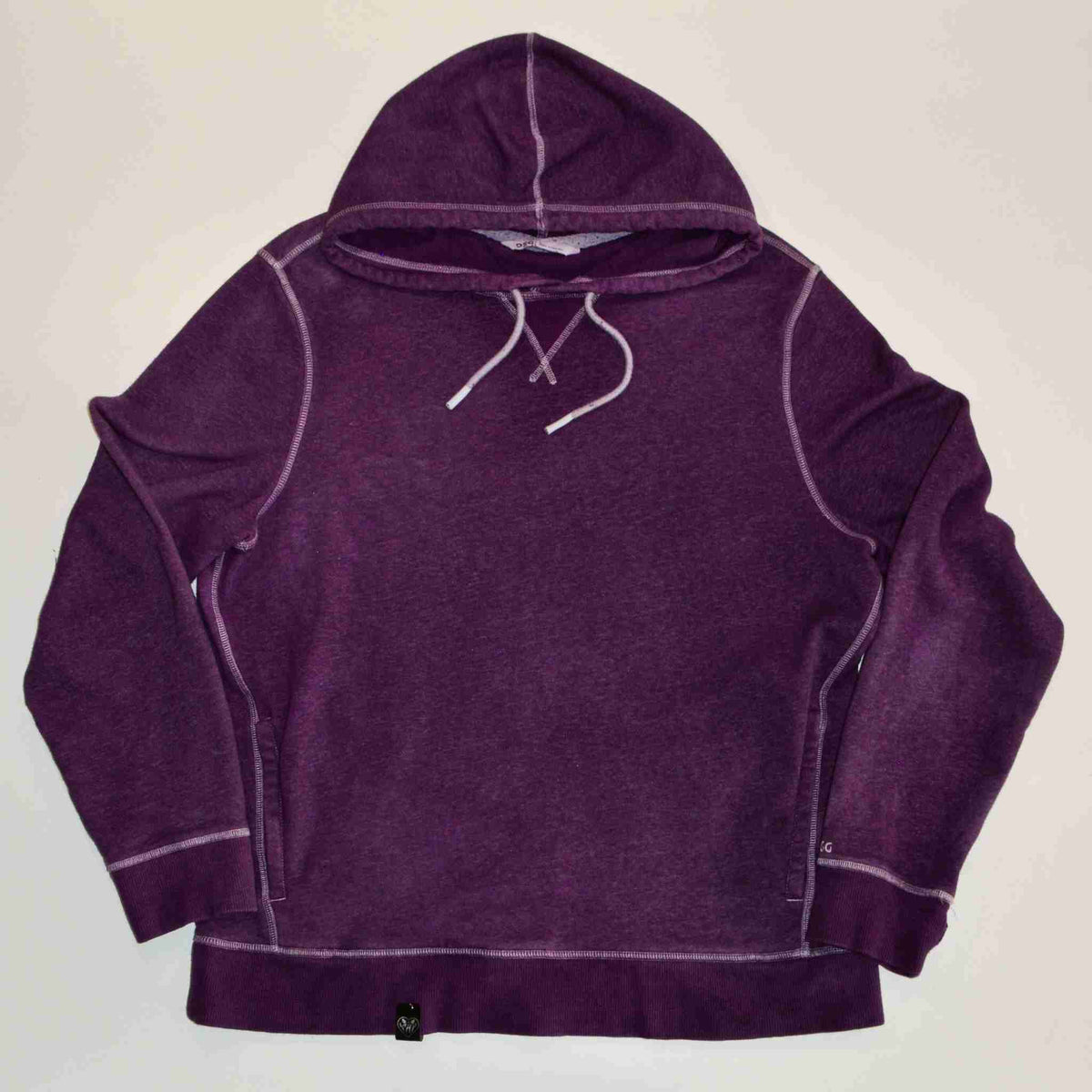 a purple sweatshirt with a hoodie on top of it.