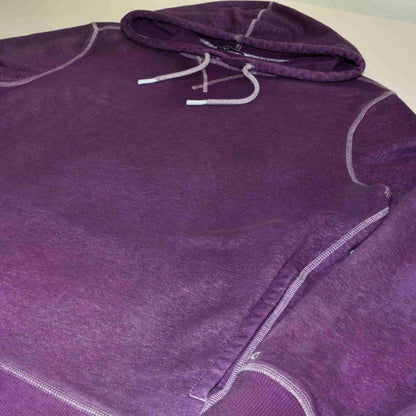 a purple hoodie with a white stitching on the side.