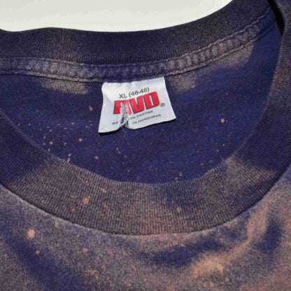 a close up of a t - shirt with a tag on it.