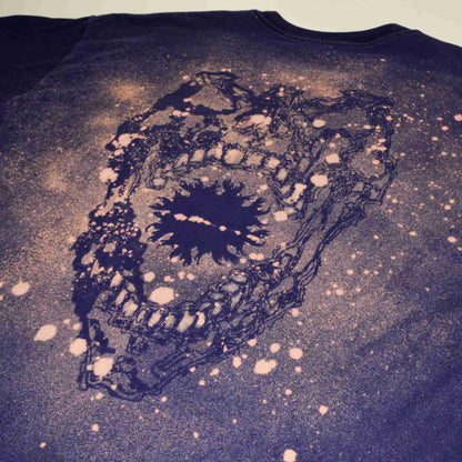 a t - shirt with a picture of a skull on it.