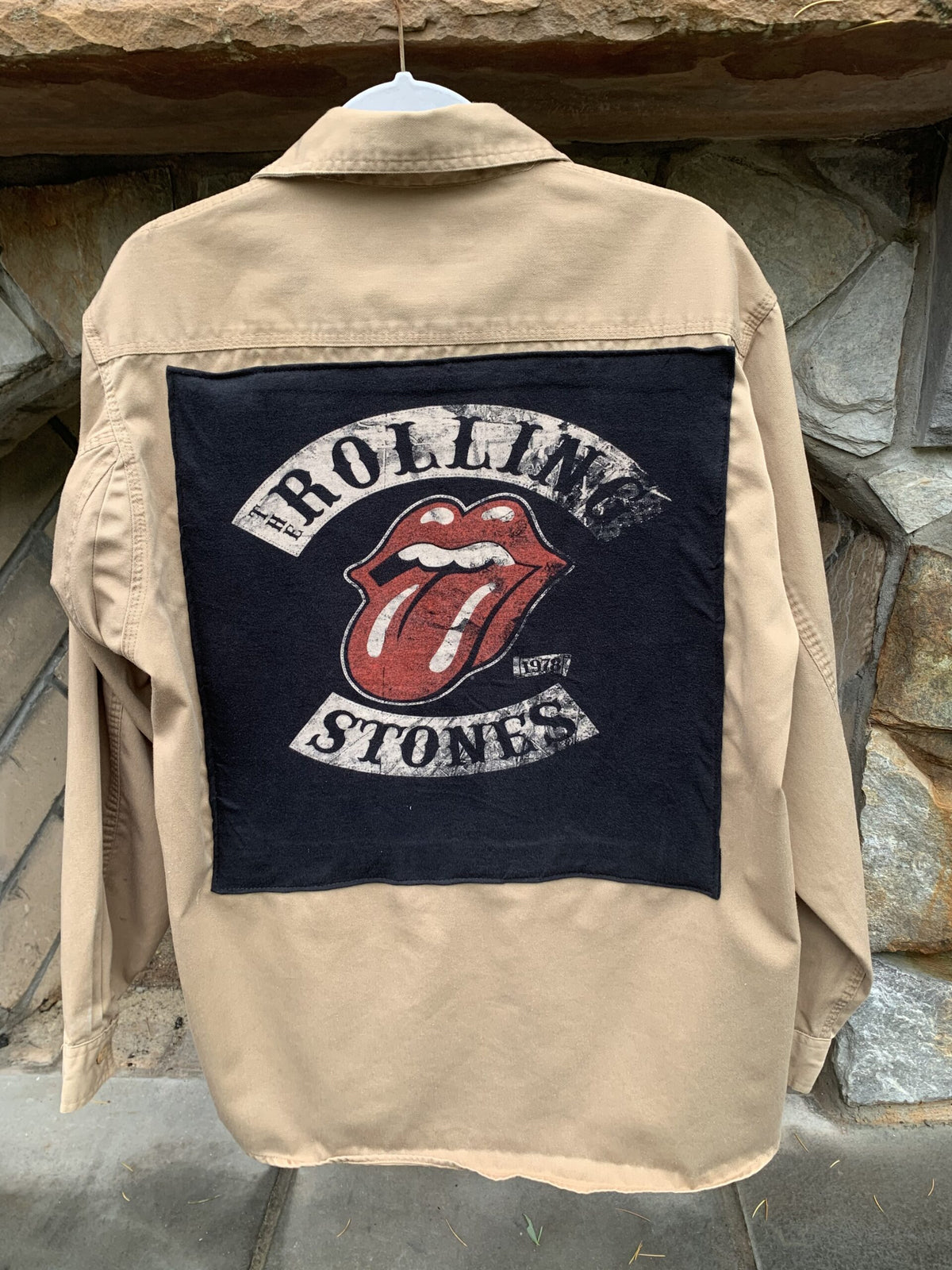 a jacket with the rolling stones on it.