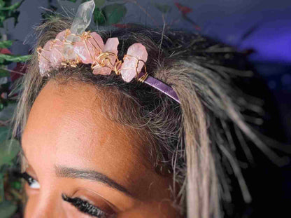 a close up of a woman with a flower in her hair.