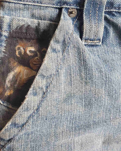 a pocket with a picture of a monkey on it.