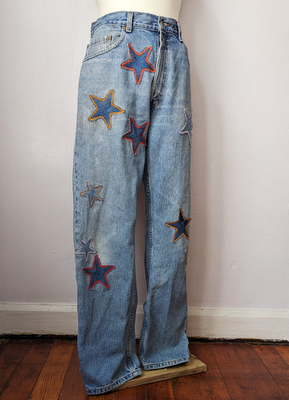 A mannequin wearing a pair of jeans with stars on them.