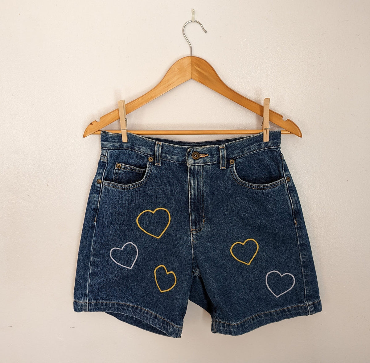 a pair of Embroidered Heart Shorts.