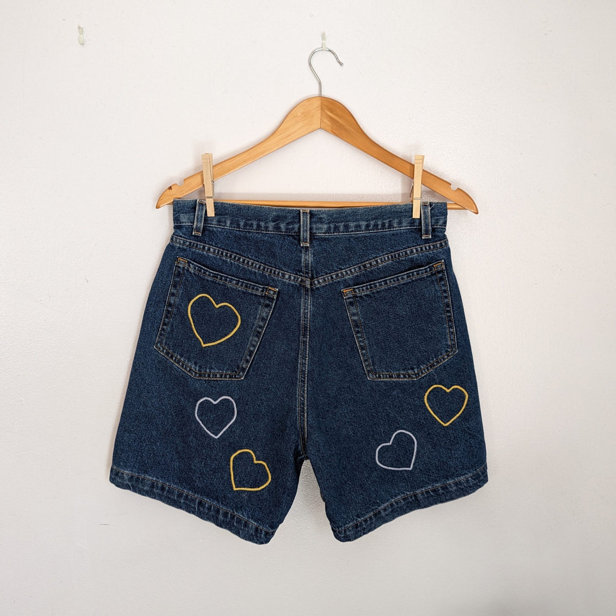 a pair of Embroidered Heart Shorts.