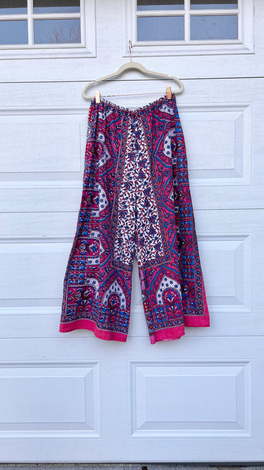 a pair of shorts hanging on a garage door.