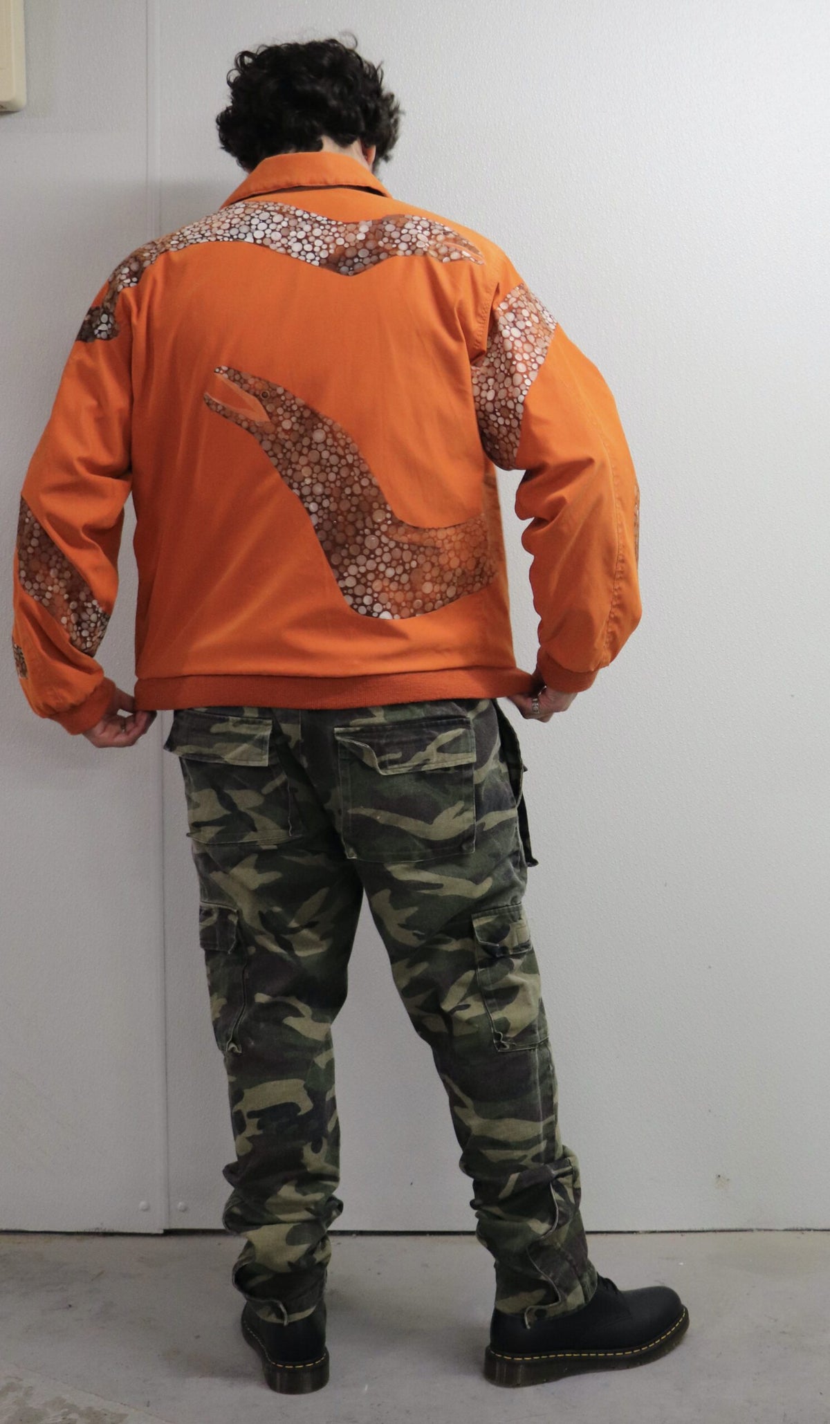 Orange jacket with hand-painted eels