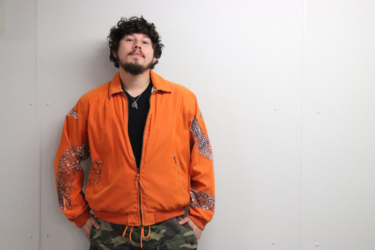 Orange jacket with hand-painted eels