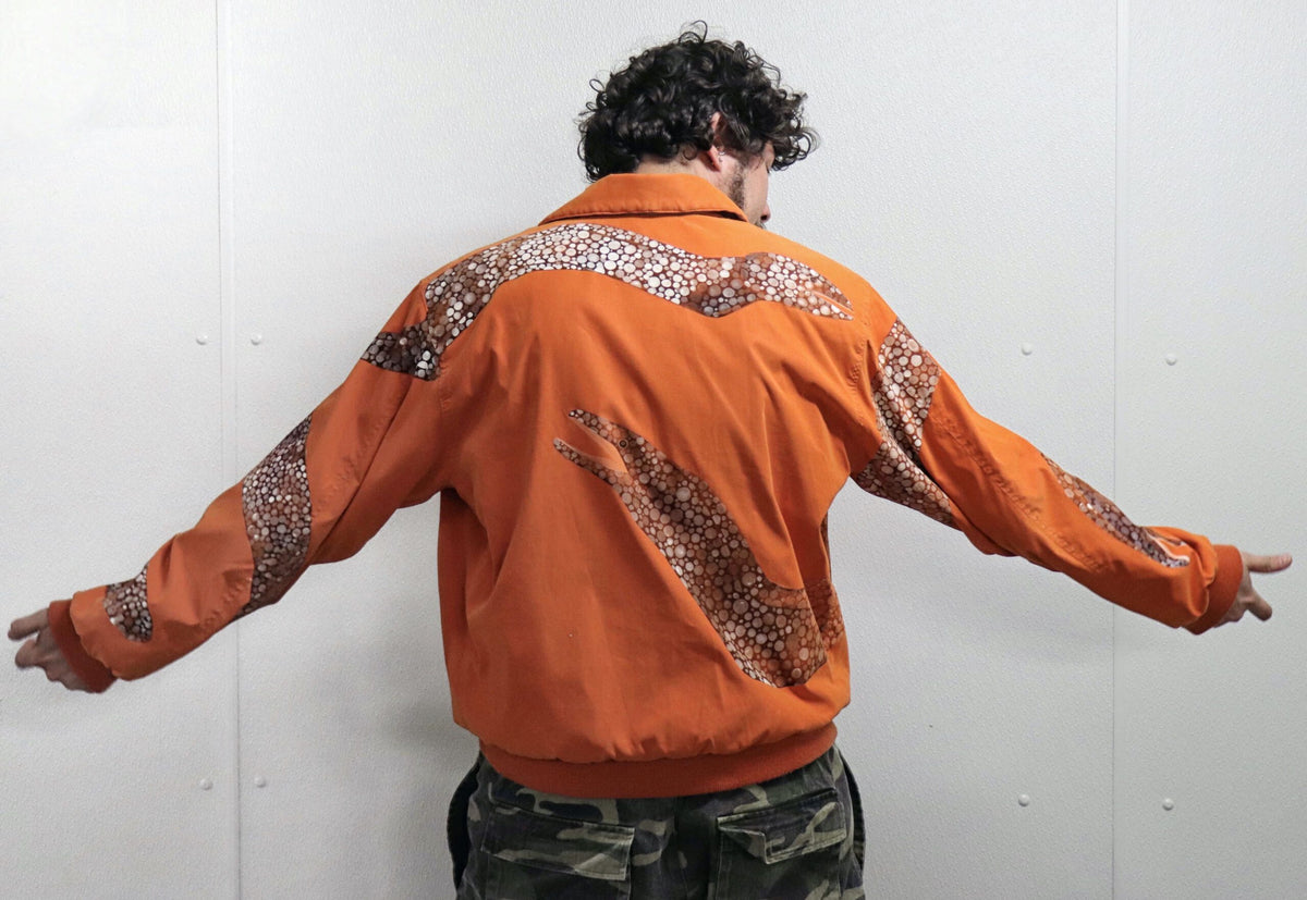 Orange jacket with hand-painted eels