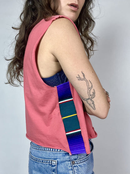 a woman with a tattoo on her arm.
