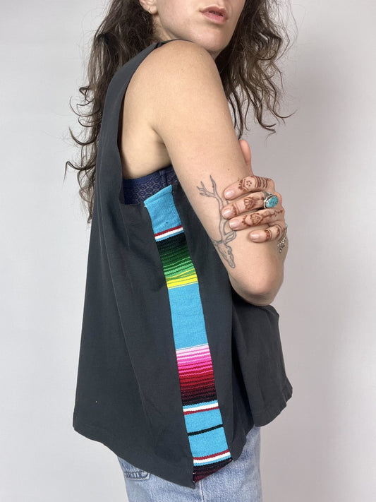 a woman with a tattoo on her arm.