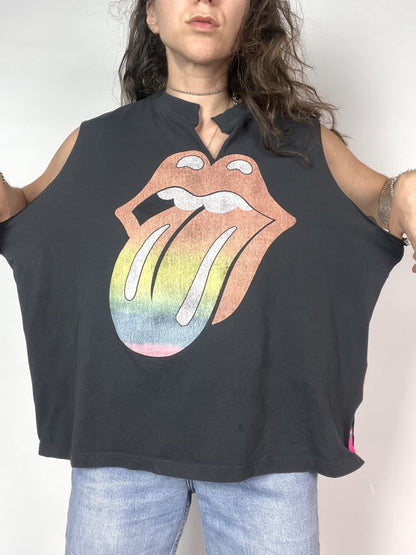 a woman wearing a black shirt with the rolling stones on it.