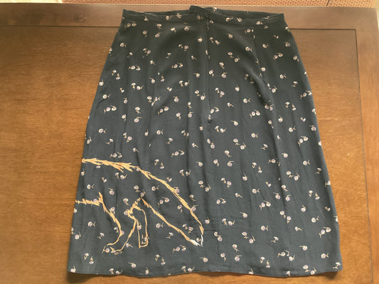 A Floral fox hand-painted vintage skirt with a picture of a person holding an umbrella.