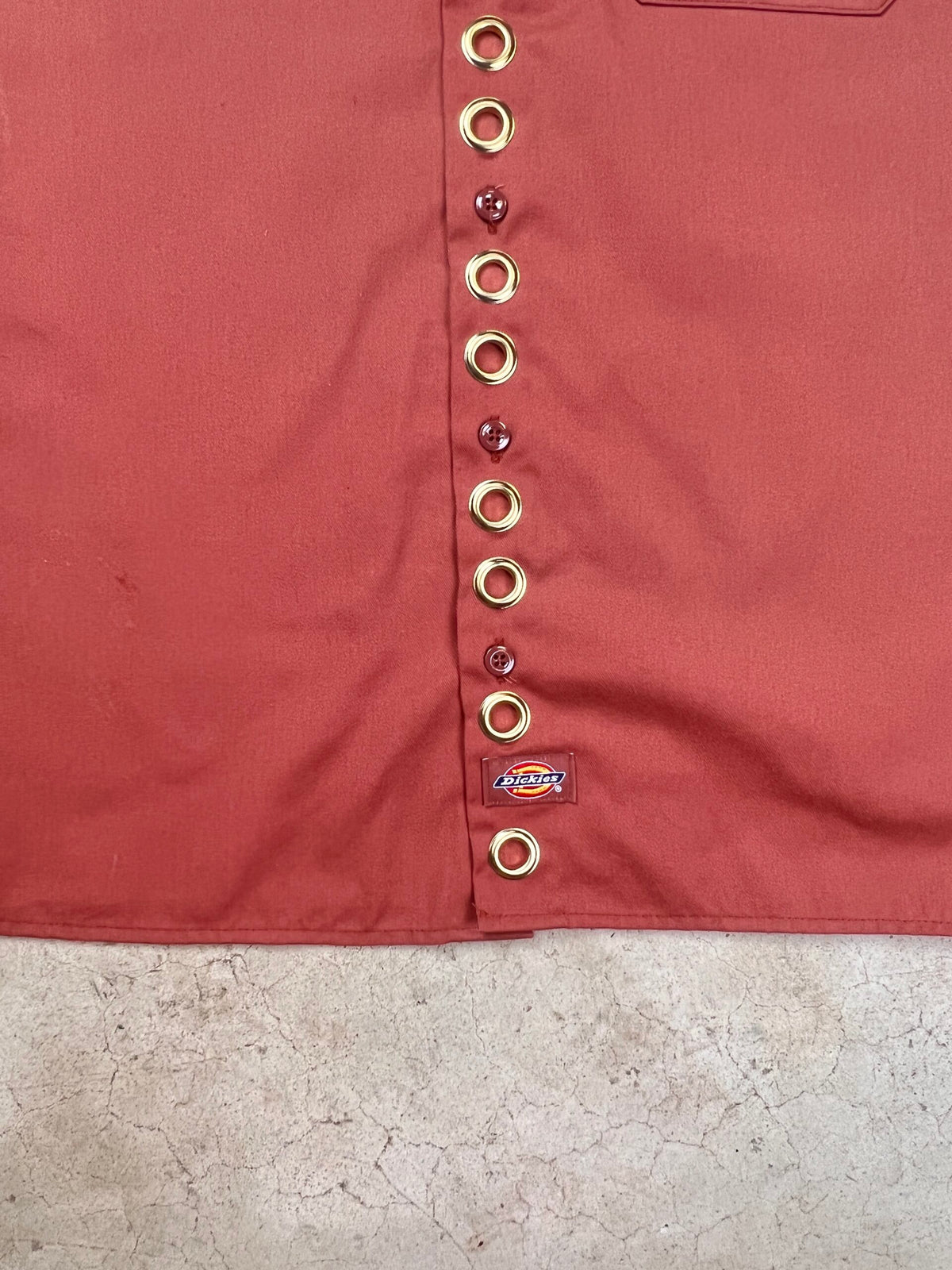 A close up of a red shirt.