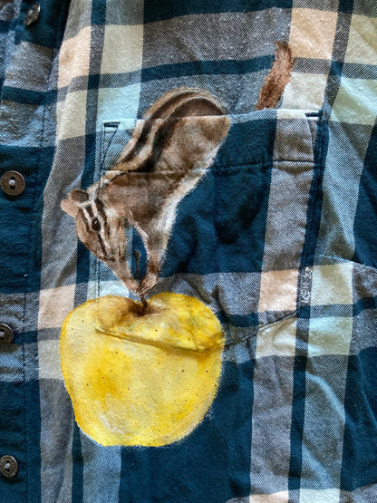 Chipmunk and apple hand-painted on blue plaid shirt