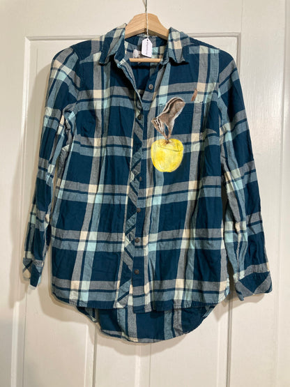 Chipmunk and apple hand-painted on blue plaid shirt