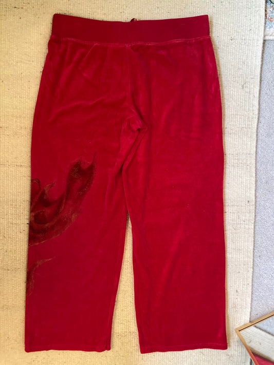 A pair of hand-painted red sweatpants.