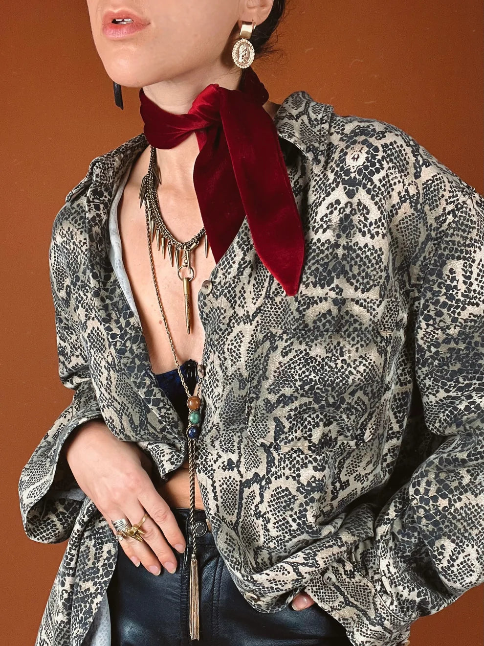 a woman wearing a red velvet bow tie.