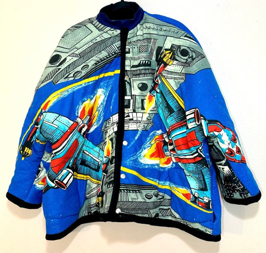 A blue jacket with a star wars design on it.