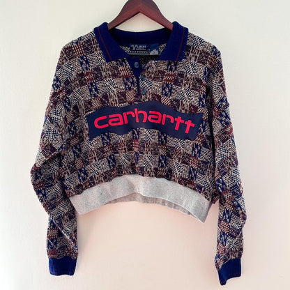 A sweater with the word carhartt on it.