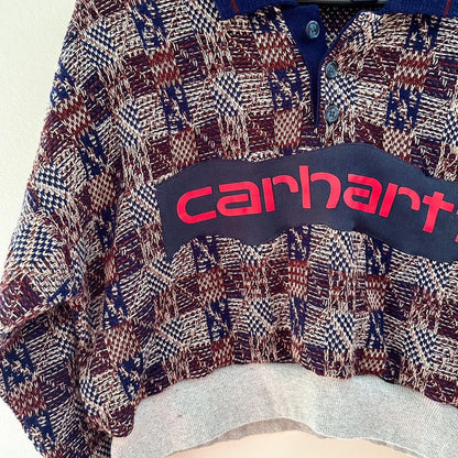 A sweater with the word carhartt on it.