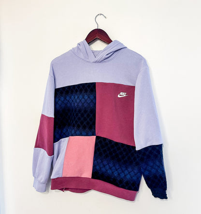 Nike patchwork hoodie in purple and pink.
