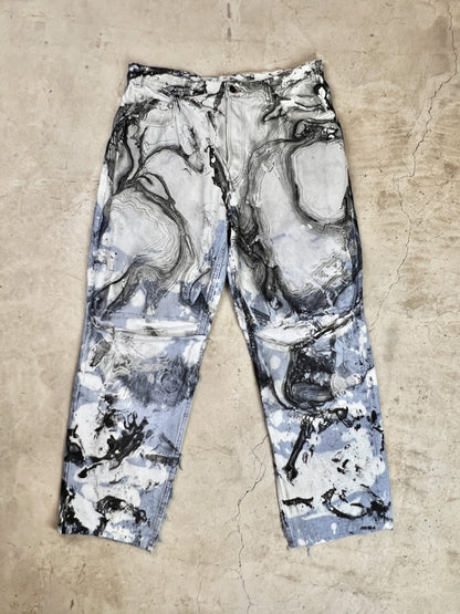 A pair of pants with a black and white pattern.