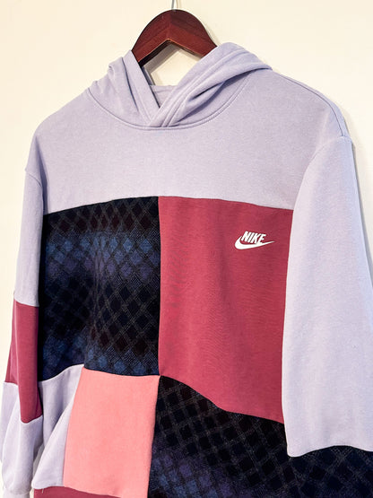 Nike patchwork hoodie in purple and pink.