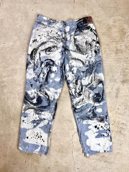 A pair of blue and white pants with a black and white pattern.
