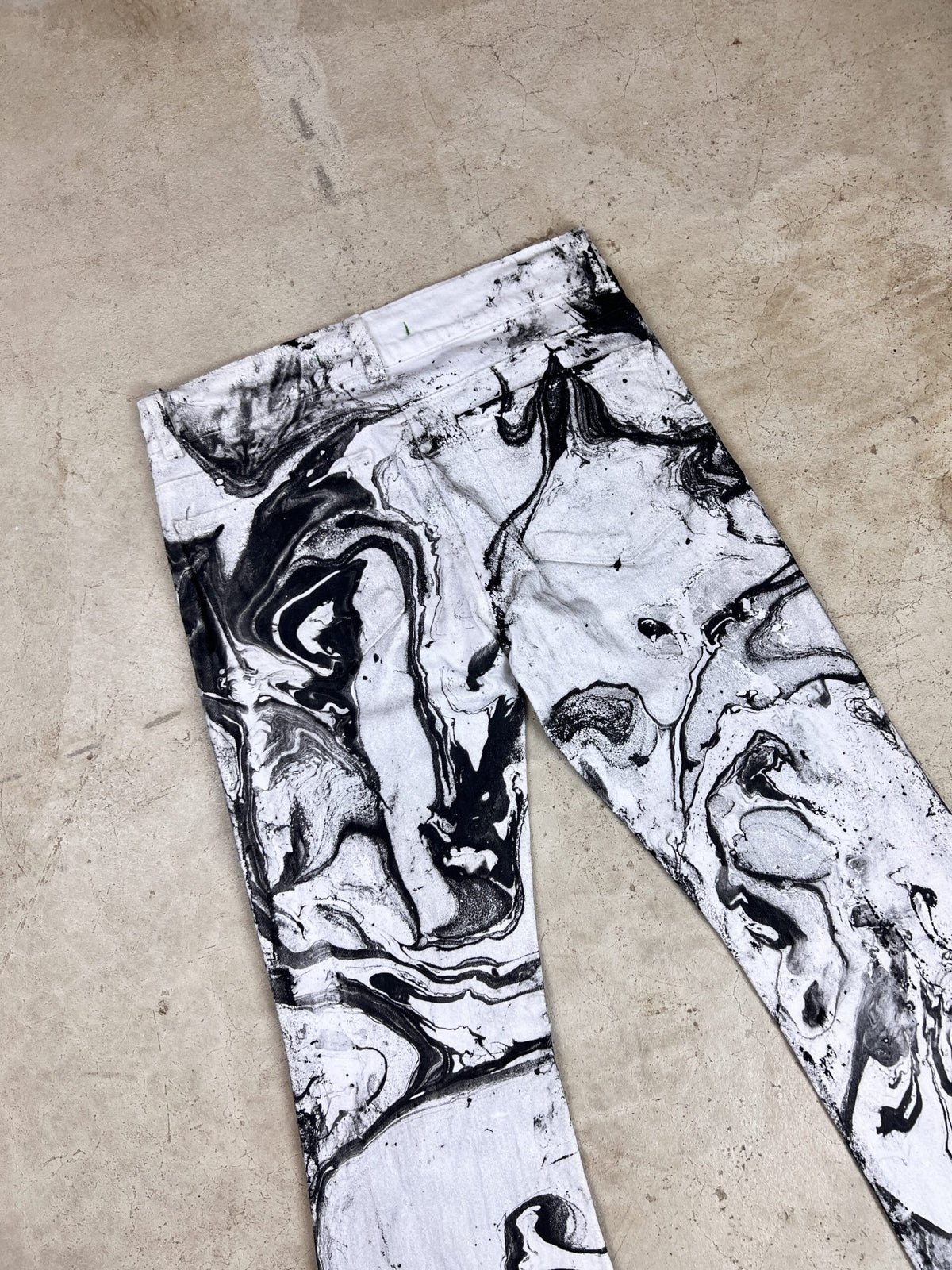 Black and white marbled leggings.