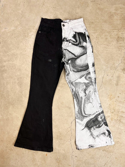 A pair of black and white flared pants.