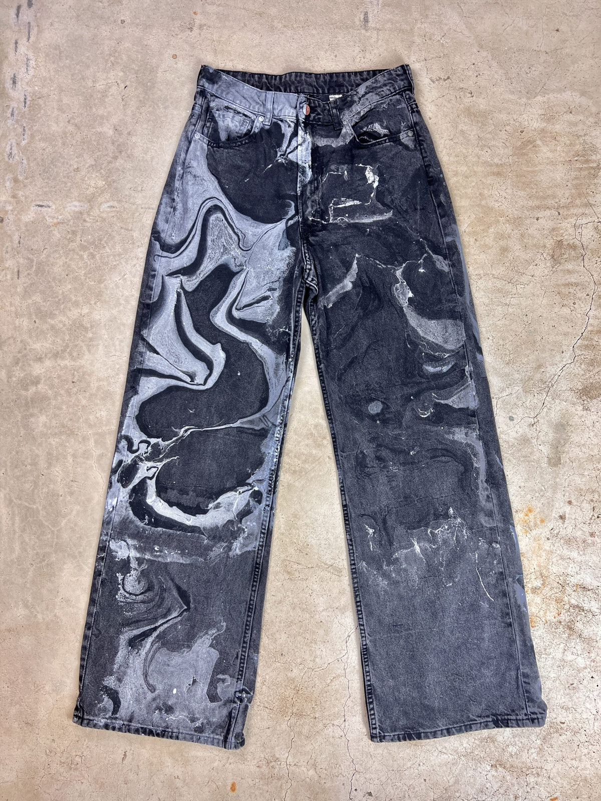 A pair of black and white pants with a black and white pattern.