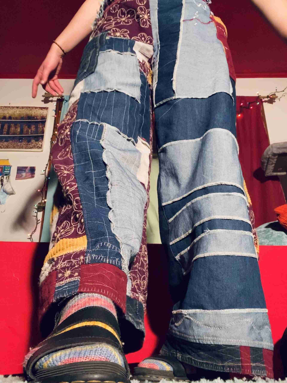 a person standing on top of a red carpet.