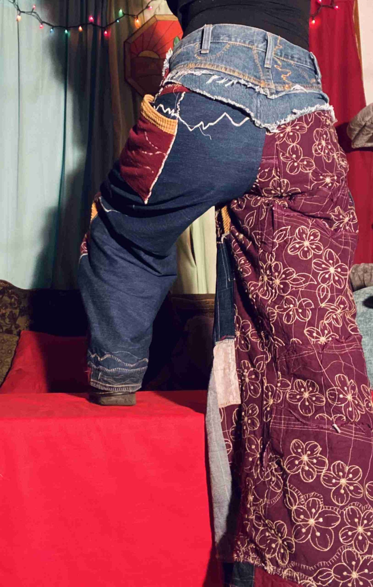 a person standing on top of a red carpet.
