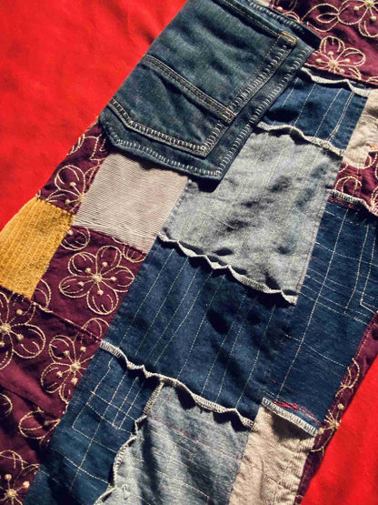a close up of a patchwork piece of cloth.