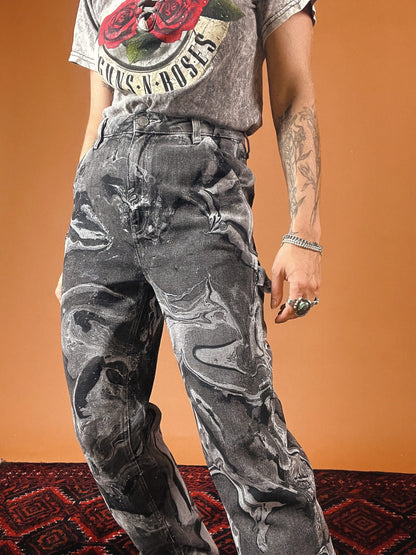 A woman wearing a t - shirt and jeans.