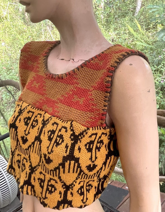 a mannequin wearing a top with a pattern on it.