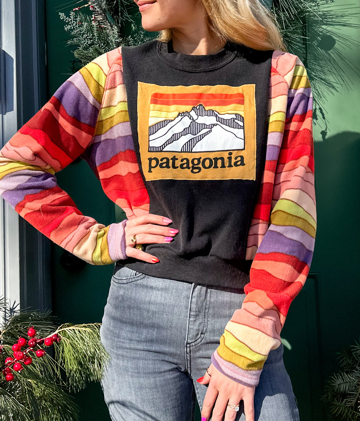 A woman wearing a colorful shirt.