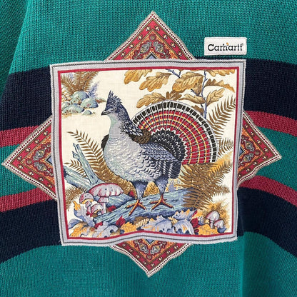 A sweater with an image of a turkey on it.