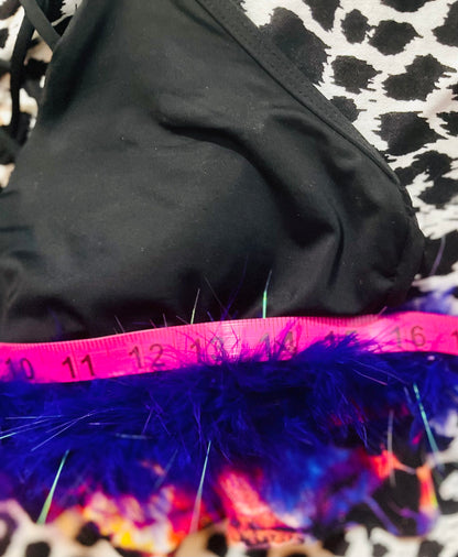 A black bikini with purple feathers and a measuring tape.