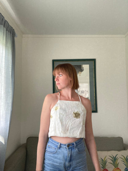 A woman is standing in a living room.