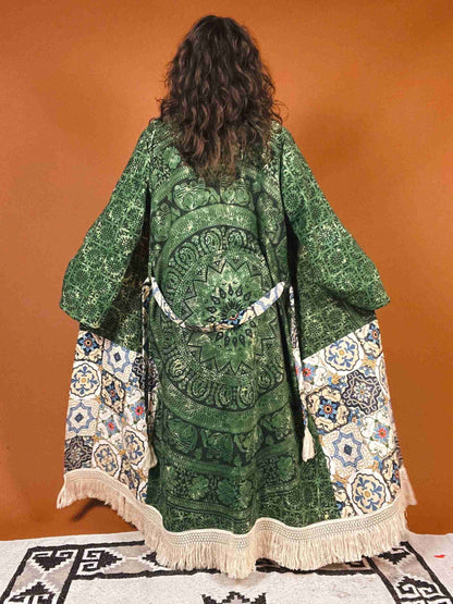 a woman in a green dress standing on a rug.
