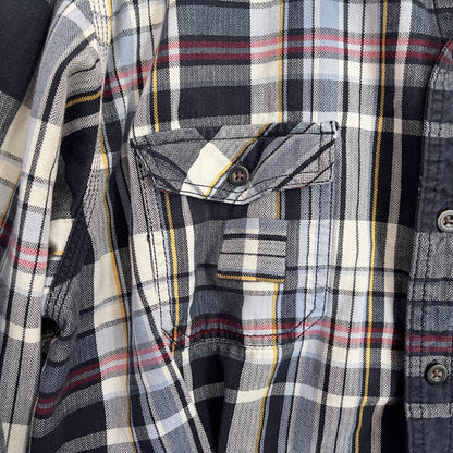 A close up of a plaid shirt.