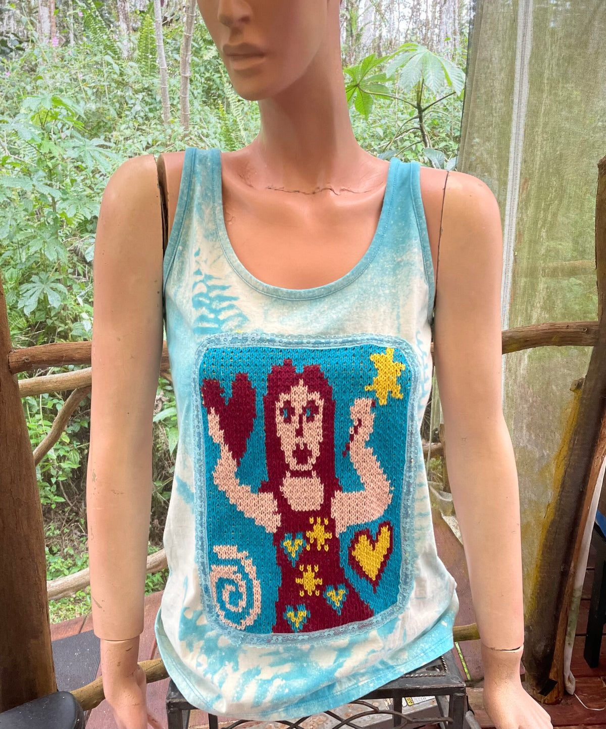 Fairy on blue tank top.