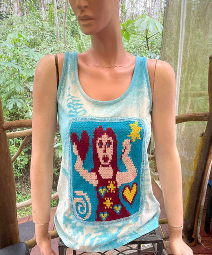 Fairy on blue tank top.