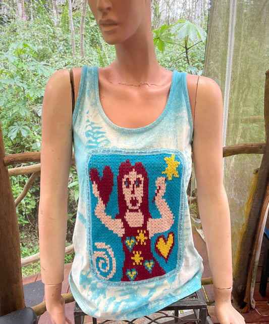 Fairy on blue tank top.